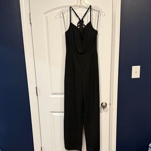 Francesca's Collections Black Strappy Jumpsuit